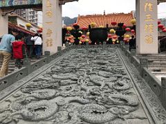 04B Nine dragon wall - Nine means the emperor and dragon mean the heaven at gateway to Wong Tai Sin temple Hong Kong